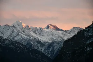 a view of a mountain range at sunset jigsaw puzzle