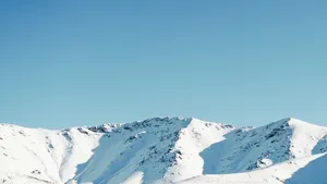 snow covered mountain under blue sky during daytime jigsaw puzzle