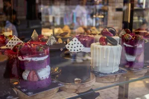 Vibrant assortment of cakes and pastries in a bakery display, Istanbul, Turkey. jigsaw puzzle