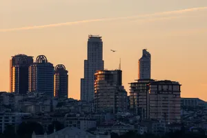 A breathtaking view of Istanbul's skyscrapers silhouetted against a vibrant sunset. jigsaw puzzle