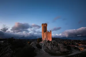Captivating view of Torre de los Balcones in Madrid, Spain, with dramatic evening sky. jigsaw puzzle