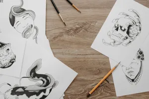 Creative sketch designs and drawing tools neatly arranged on a wooden table in a flat lay setup. jigsaw puzzle