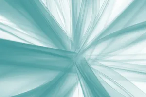 Intricate abstract design with flowing teal lines creating a dynamic background. jigsaw puzzle