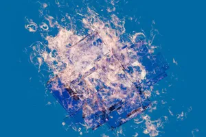 A vibrant abstract art piece featuring a fiery geometric design against a blue background. jigsaw puzzle