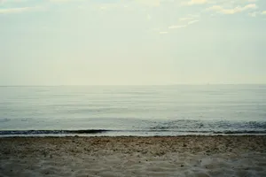 a view of the ocean from a sandy beach jigsaw puzzle