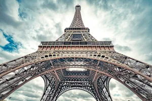 a tall metal tower with Eiffel Tower in the background jigsaw puzzle