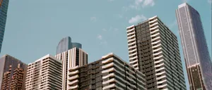 low-angle photo of buildings under blue sky jigsaw puzzle