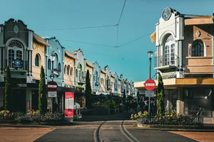 a street with a train track going through it jigsaw puzzle