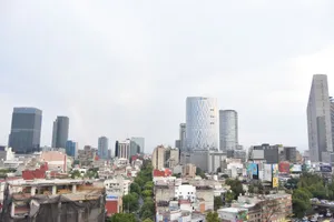 Aerial view of Mexico City's modern skyline with tall skyscrapers and urban landscape. jigsaw puzzle