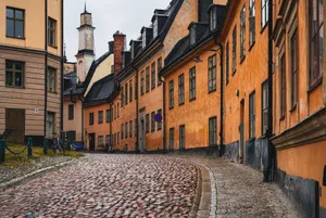 Beautiful narrow street lined with colorful historic buildings in Gamla Stan, Stockholm. jigsaw puzzle
