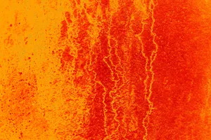 Dynamic abstract texture in vibrant orange and red tones, resembling flowing lava or a fiery landscape. jigsaw puzzle