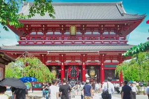 people walking on street near red and white building during daytime jigsaw puzzle