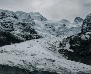 Breathtaking view of the snowy peaks in Graubünden, Switzerland, showcasing pristine winter wilderness. jigsaw puzzle