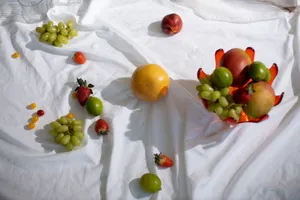 From above of fresh sweet delicious fruits composed on white fabric in daylight jigsaw puzzle