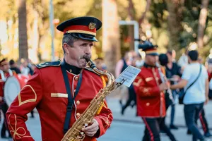 Vibrant marching band performance in Denizli, Turkey captured outdoors with musicians in uniform. jigsaw puzzle