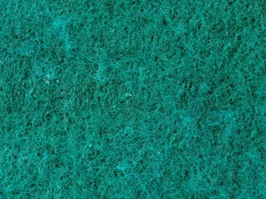Close-up view of an emerald green textured surface, ideal for background use. jigsaw puzzle
