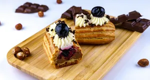 brown and white cake on brown wooden board jigsaw puzzle