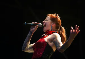 woman singing on wireless microphone jigsaw puzzle