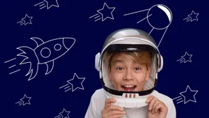 Smiling child in an astronaut helmet with a space-themed background. jigsaw puzzle