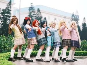 A vibrant cosplay group in colorful school uniforms posing outdoors with cheerful expressions. jigsaw puzzle
