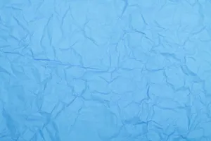 High-quality wrinkled blue paper texture perfect for backgrounds and designs. jigsaw puzzle