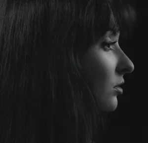Stunning monochrome profile portrait of a woman in Kyiv, highlighting elegance and grace. jigsaw puzzle