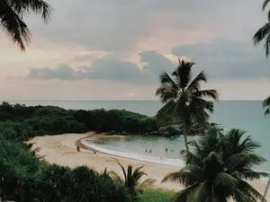 island with white sand during daytime jigsaw puzzle