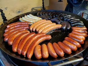 sausage on black round plate jigsaw puzzle