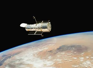 an image of a satellite above the earth jigsaw puzzle