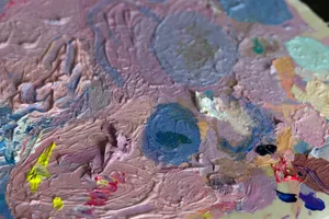 a close up of a paint palette with multiple colors jigsaw puzzle