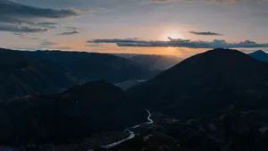 A breathtaking sunrise over the mountain range in Cusco, Peru, capturing nature's beauty. jigsaw puzzle