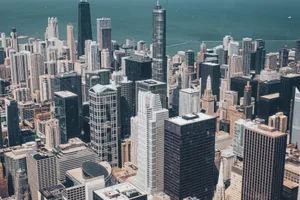 Stunning aerial view of Chicago's skyline showcasing modern skyscrapers against Lake Michigan. jigsaw puzzle