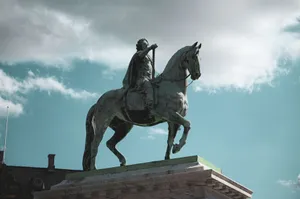 A striking equestrian statue against a blue sky in Copenhagen, Denmark. jigsaw puzzle