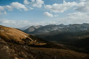 brown and green mountains under blue sky during daytime jigsaw puzzle