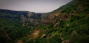 a stone bridge over a valley jigsaw puzzle