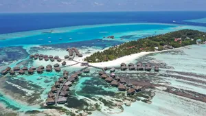 an aerial view of a resort in the middle of the ocean jigsaw puzzle