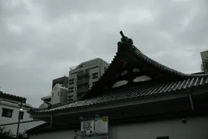 Traditional japanese temple roof against cloudy sky. jigsaw puzzle