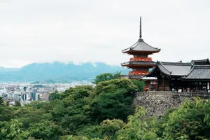 A japanese pagoda overlooks a lush green landscape. jigsaw puzzle