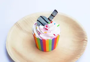 a cupcake with white frosting and sprinkles jigsaw puzzle
