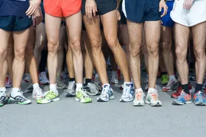 man in blue shorts and white nike sneakers jigsaw puzzle