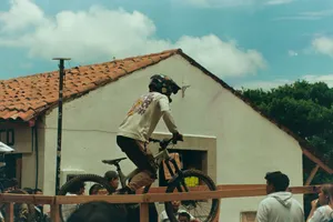 Mountain biker jumps over a wooden barrier jigsaw puzzle
