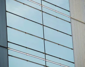 Modern building facade with glass and metal panels jigsaw puzzle