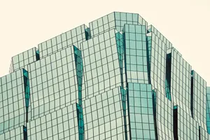 Modern glass building against a clear sky. jigsaw puzzle