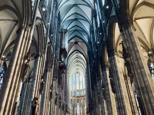 the interior of a large cathedral with high vaulted ceilings jigsaw puzzle