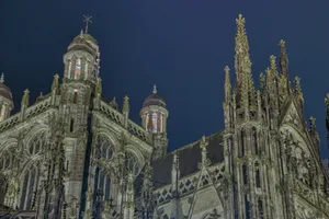 gray concrete church under blue sky during daytime jigsaw puzzle