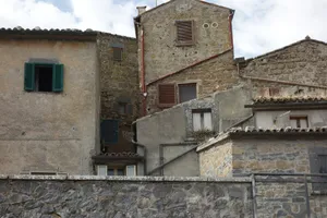 Old stone buildings with windows and shutters. jigsaw puzzle