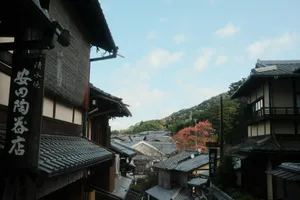Traditional japanese buildings with autumn foliage in background jigsaw puzzle