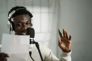 a man wearing headphones and holding a microphone jigsaw puzzle