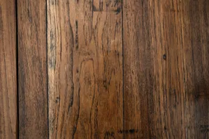 A close up of a brown wooden surface jigsaw puzzle