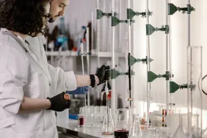 Scientists in lab coats work with test tubes in a modern laboratory. jigsaw puzzle